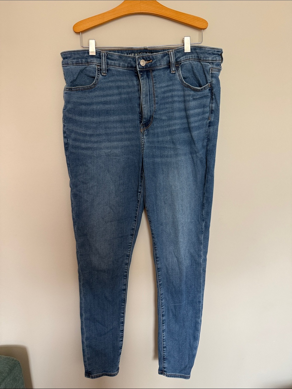 American Eagle Outfitters Light Blue Denim Jeans with Tan Stitching